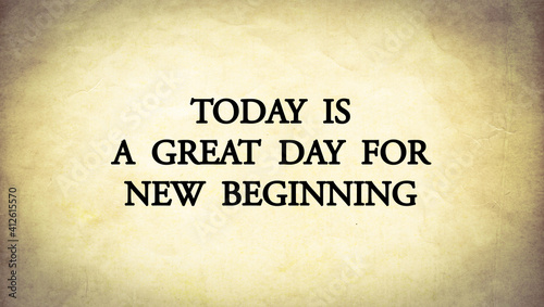 Inspire quote on old paper background “Today is a great day for new beginning “