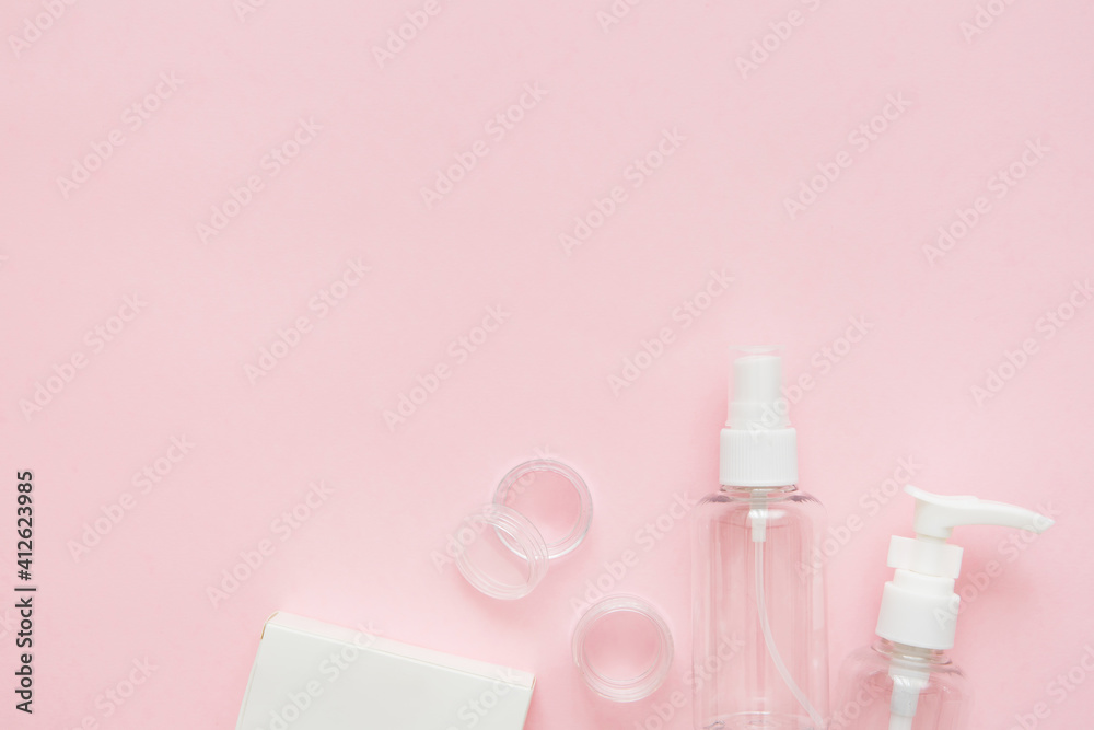 Skin care mockup. Beauty concept. Skin care products, bottles, spray and soap on pink background. Copy space. Skin care mockup. Beauty concept. Skin care products, bottles, spray and soap on pink background. Copy space.
