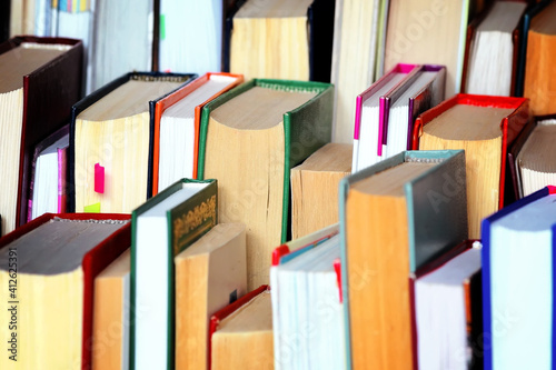 Wallpaper Mural This is a lot of books standing together in several rows. Solid background of books in close-up. The concept of education and reading literature. Torontodigital.ca
