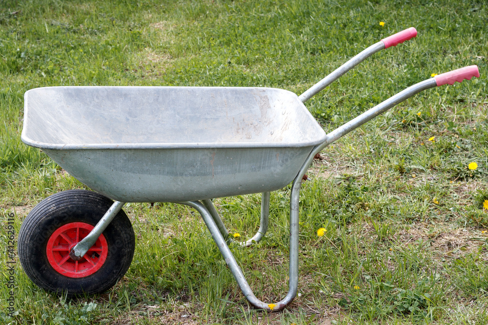 Garden wheelbarrow close-up. Garden trolley.