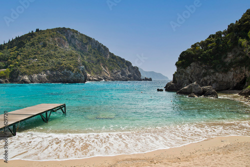 The beautiful pristine beach at Corfu island , Greece