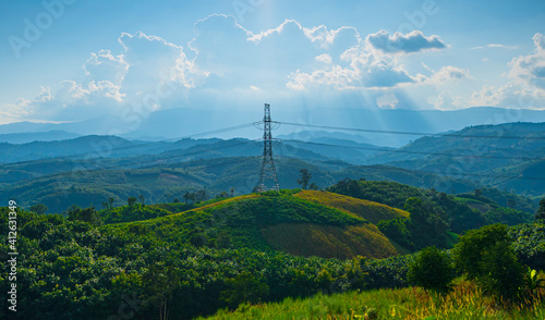 Power line pylon in mountainous area