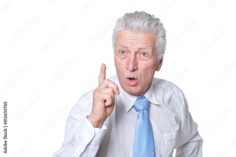 close up portrait of senior businessman in formal wear pointing with finger close up portrait of senior businessman in formal wear pointing with finger