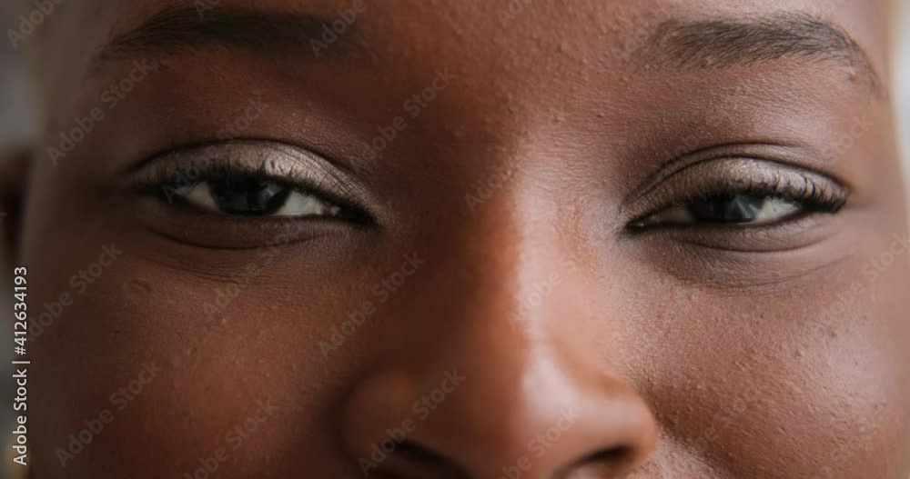 Close up of happy woman blinking her eyes