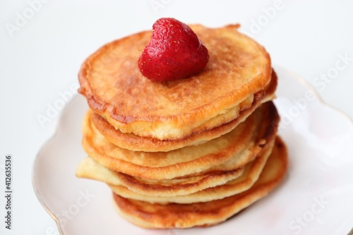 Sweet pancakes for breakfast with berries
