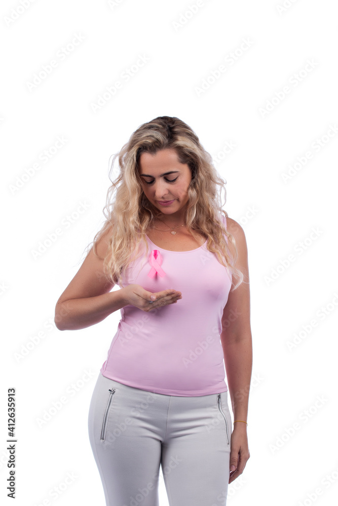 Caucasian girl holding breast cancer ribbon Caucasian girl holding breast cancer ribbon
