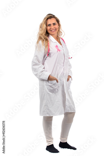 Caucasian doctor woman with pink stethoscope and ribbon