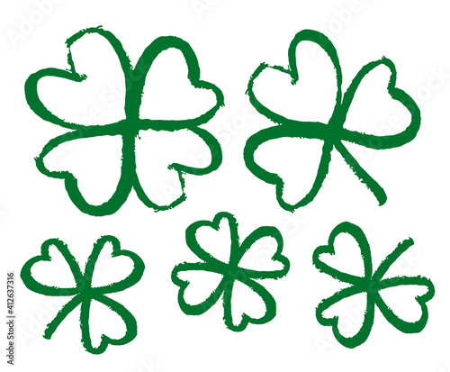 Sketch line clover. Hand drawn brush shamrocks on white background.