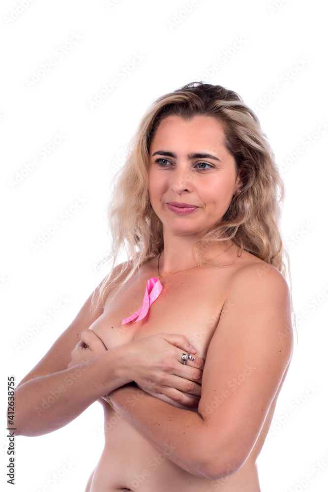 woman covering breasts with hands with pink ribbon woman covering breasts with hands with pink ribbon