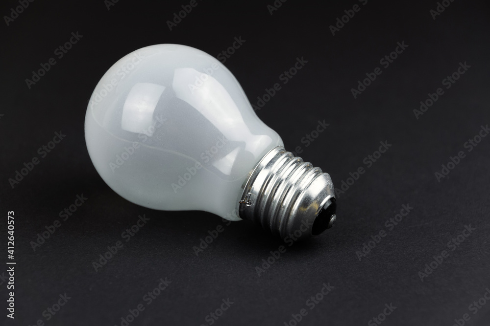 light bulb on a black background light bulb on a black background