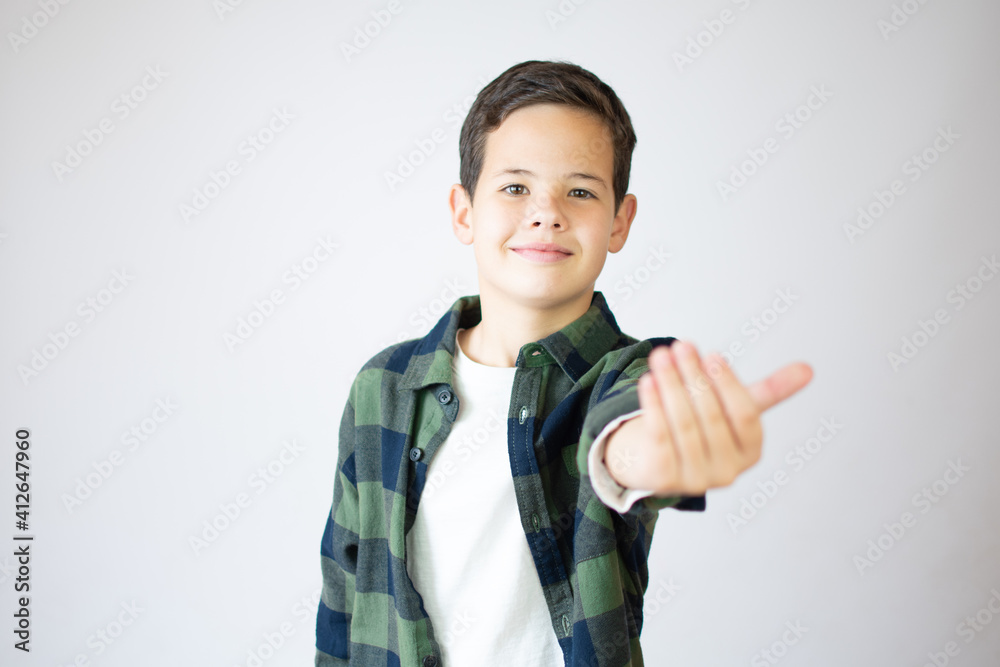 Little boy presenting and inviting to come on white background Little boy presenting and inviting to come on white background