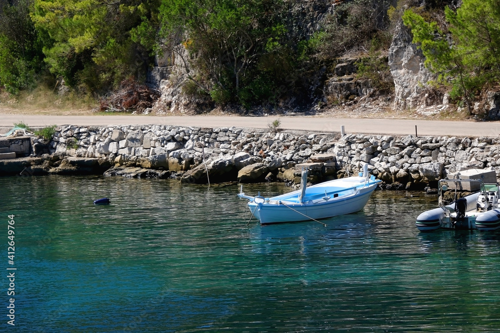 Fototapeta premium Small fishing boats in the picturesque bay on island Lastovo, Croatia.