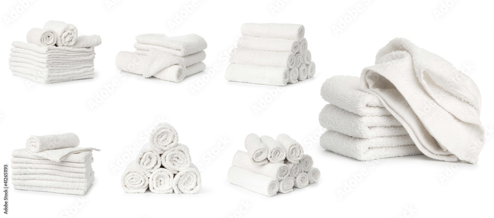 © Nana_studio - set of white spa towels stacked and in basket isolated on white background