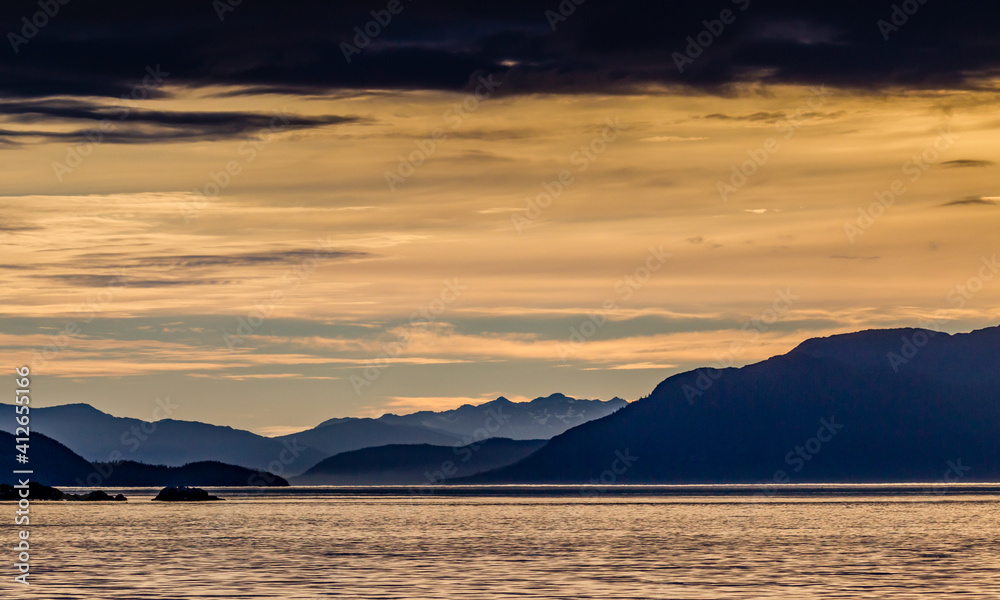 Dramatic sunset near Elfin cove in Alaska