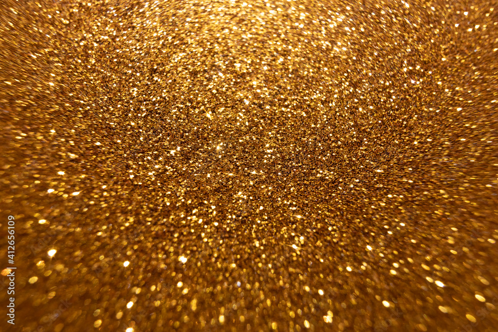 elegant gold glitter bokeh backdrop. abstract gold background with glitter sparkle bokeh