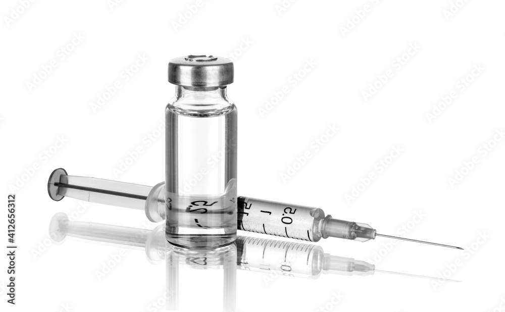 Medical ampoules and syringe, isolated on white Medical ampoules and syringe, isolated on white