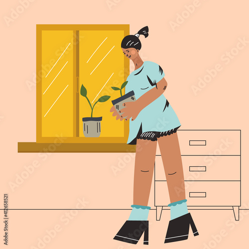 A girl puts a pot with a flower on the window, a girl at home