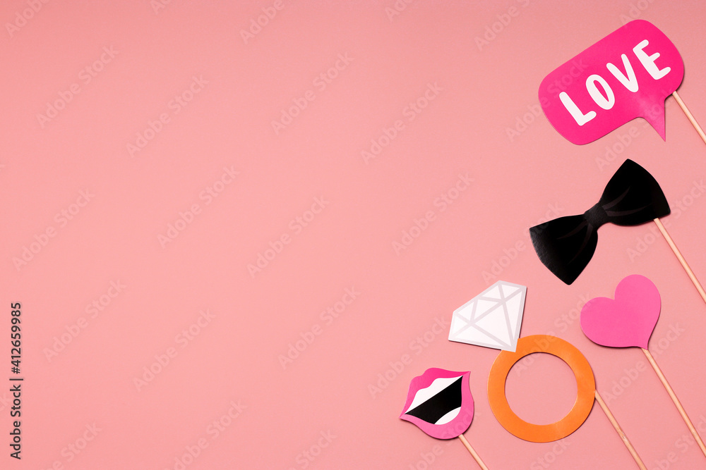 Party accessories on a pink background. Postcard concept for Valentines, Womens Day, Mens Day, Wedding Day. Flat lay, top view. Copy space. Party accessories on a pink background. Postcard concept for Valentines, Womens Day, Mens Day, Wedding Day. Flat lay, top view. Copy space.