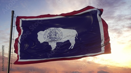 Flag of Wyoming waving in the wind against deep beautiful sky. 3d illustration photo