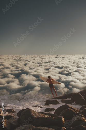 Surfing above the clouds © LightcrafterArtistry