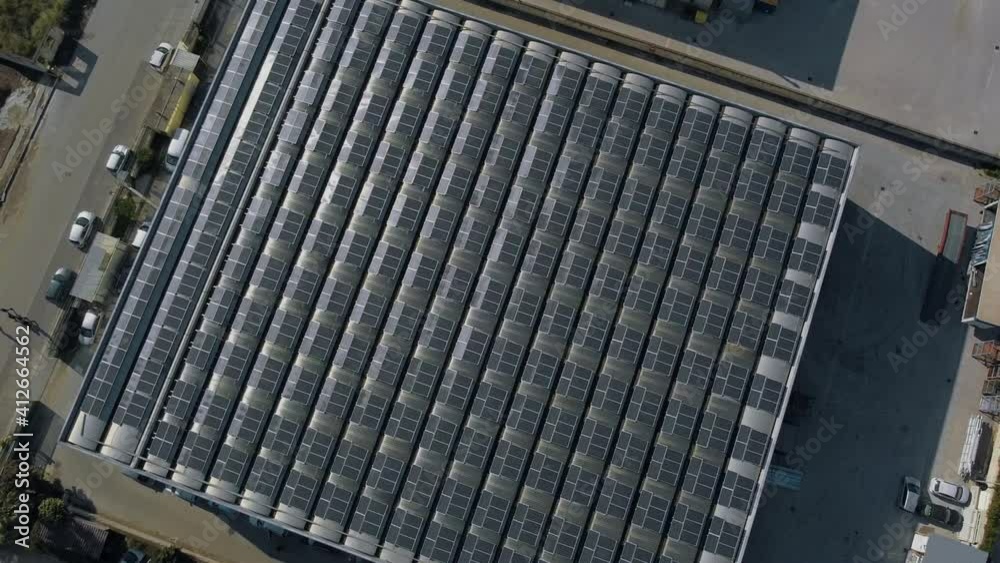 Aerial view on solar panels on the roof. Drone view Italy Caserta province on Naples Aerial view on solar panels on the roof. Drone view Italy Caserta province on Naples