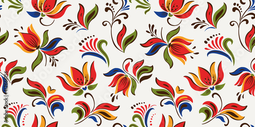 Seamless floral pattern with bright colorful flowers and tropic leaves on a white background. The elegant the template for fashion prints. Modern floral background. Trendy Folk style.