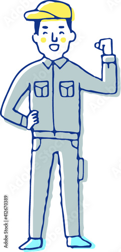 ガッツポーズをしている作業服姿の男性