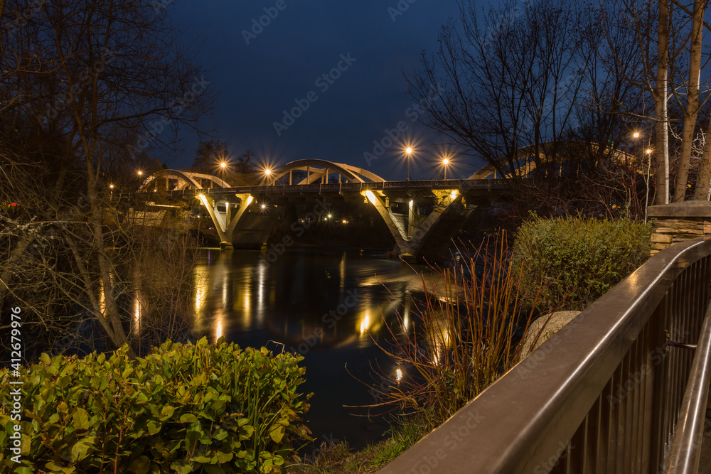 Famous Cavemen bridge over Rogue river in dusk in Grants Pass, Oregon