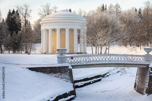Evening in the winter park. Pavlovsk, the vicinity of St. Petersburg. Russia