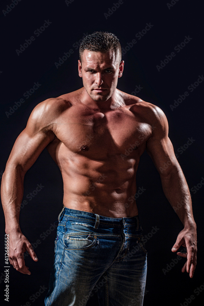 Isolated on black background. Handsome man with muscular topless body. Torso six packs attractive. six pack abs. Strong man with torso. Sexy muscular man. Sensual mans body. Fitness model