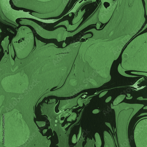 Green luxury marble ink texture on watercolor paper background. Marble stone image. Bath bomb effect. Psychedelic biomorphic art.