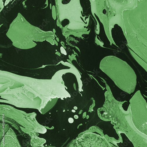 Green luxury marble ink texture on watercolor paper background. Marble stone image. Bath bomb effect. Psychedelic biomorphic art.