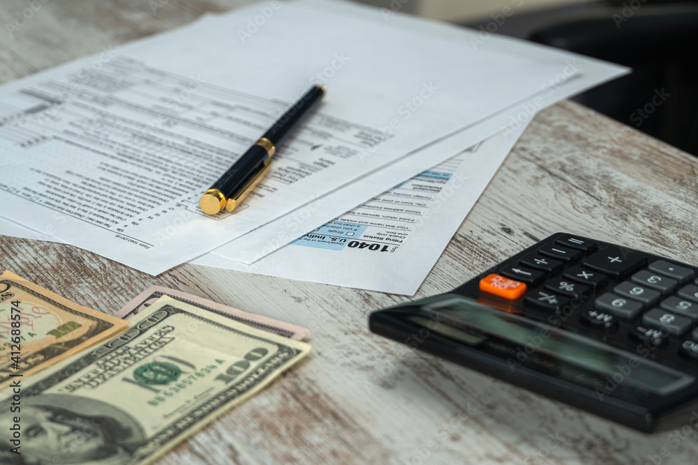 Obraz premium Tax form USA business income office concept. Tax Return Form 1040