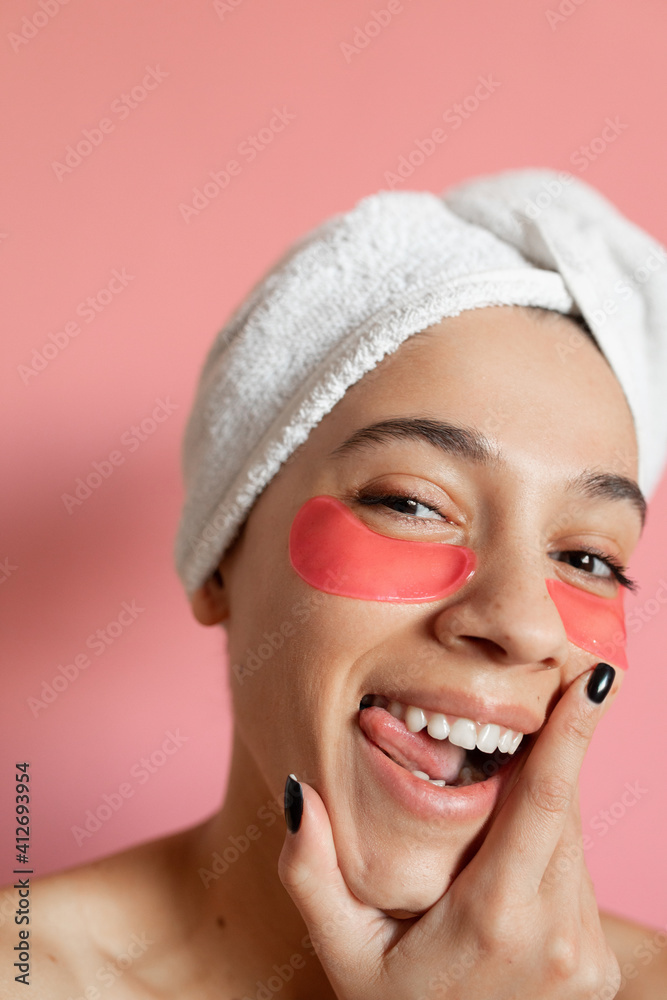Woman with perfect skin having under eye patches Woman with perfect skin having under eye patches