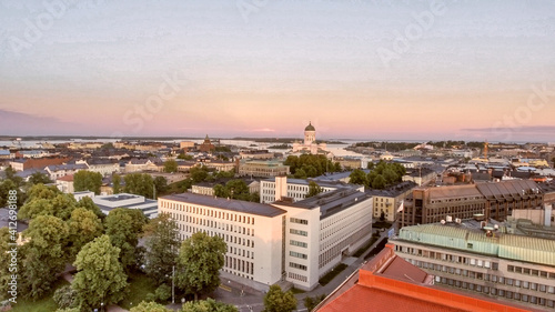 Aerial sunset view of Helsinki skyline from drone, Finland