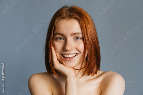 Girl posing with hand near her face