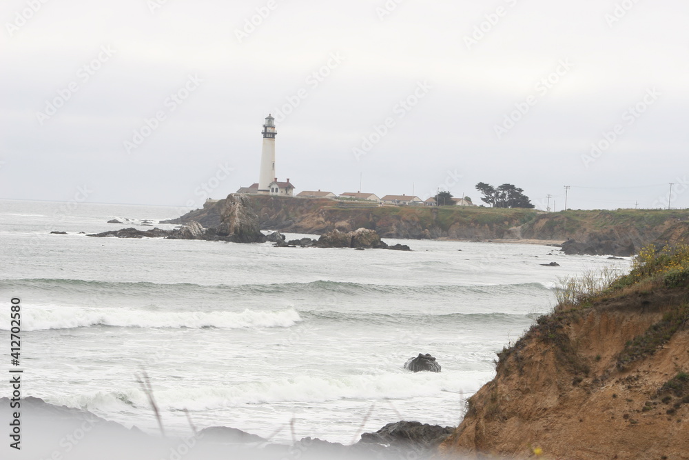 Lighthouse in the fog California coast