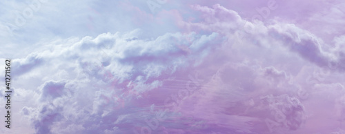 Fotografija Beautiful romantic pink blue ethereal cloudscape panoramic banner - wide sky lin