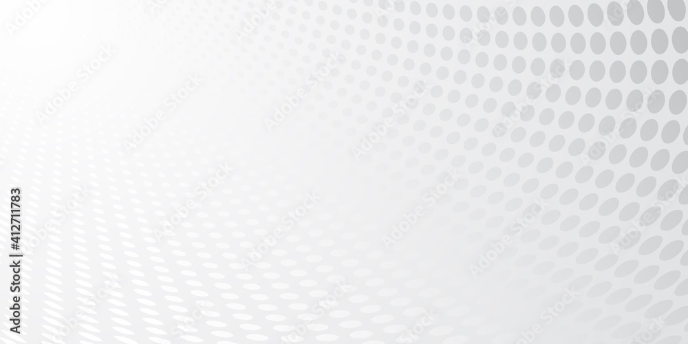 Abstract background made of halftone dots in white and gray colors Abstract background made of halftone dots in white and gray colors