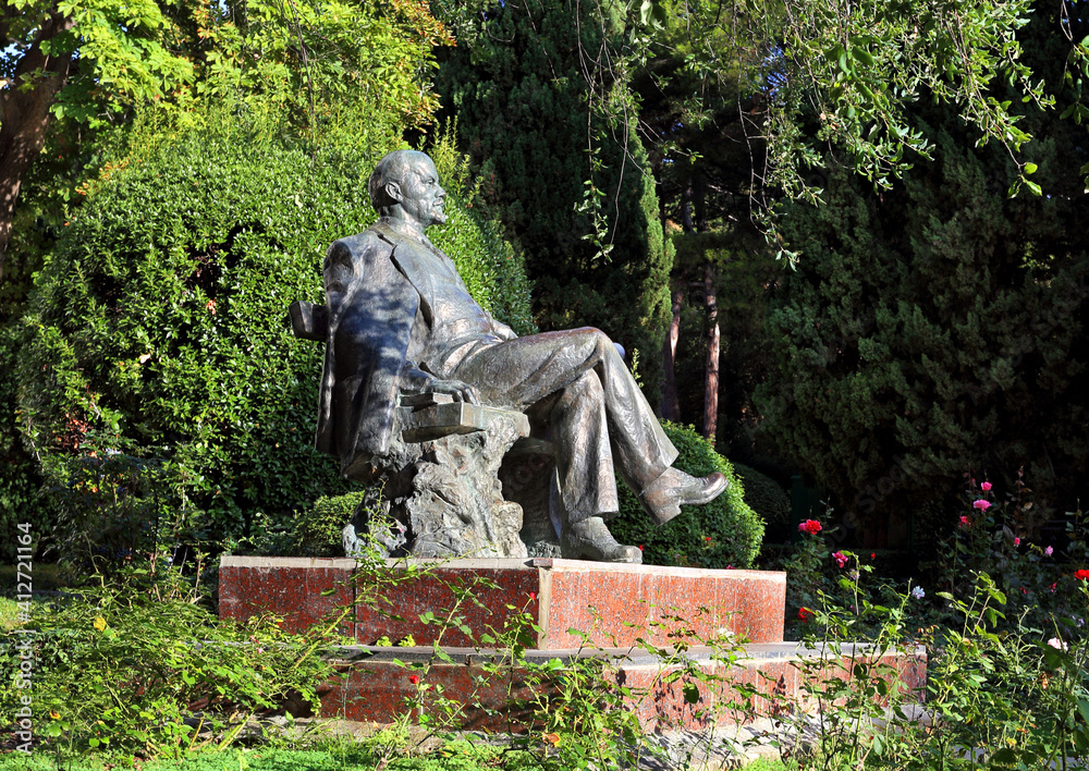 Monument to V.I. Lenin against the background of trees