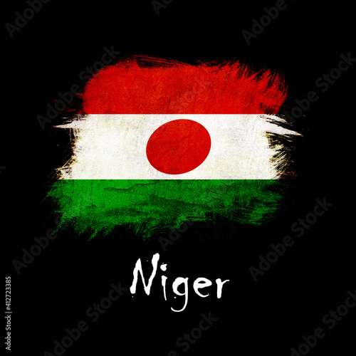 National flag of Niger, abbreviated with ne; a realistic 3d image of the national symbol from an independent country painted on a black background with the countryname below photo