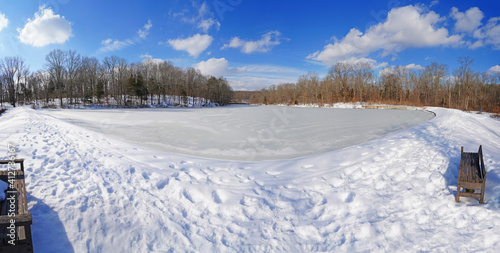 Snowy day view of the frozen lake at the Mountain Lakes Preserve in Princeton, New Jersey, United States, after a major snowfall