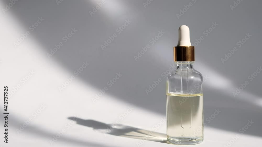 Dropper glass Bottle Mock-Up. Сosmetic pipette on white background. Dropper glass Bottle Mock-Up. Сosmetic pipette on white background.