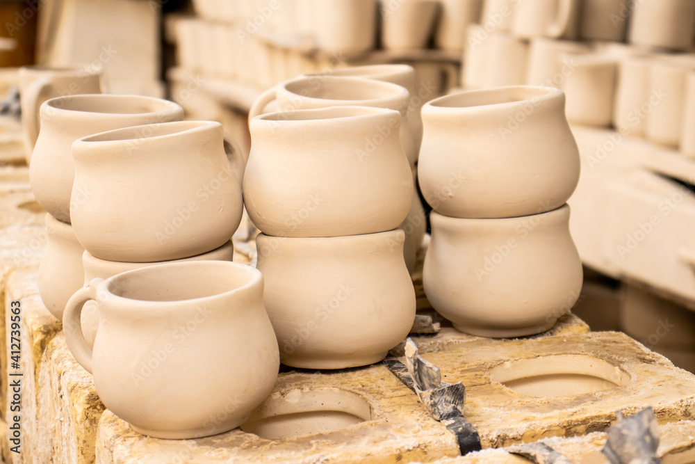 Clay injection molding technique at a traditional ceramics factory at the small city of Raquira in Colombia