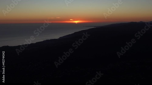 California Ocean Sunset over the Santa Monica Mountains and Pacific Palisades with Malibu in the background photo