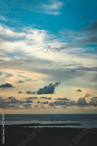 sunset on the sea with clouds