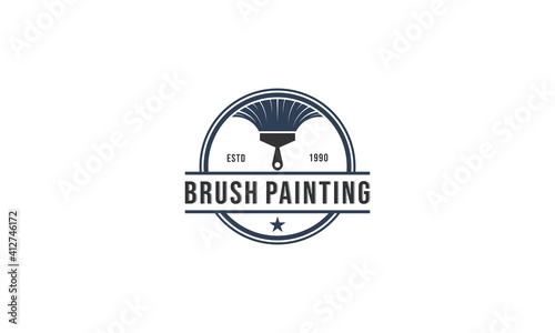 logo for house paint with brush illustration combined with the roof of the house