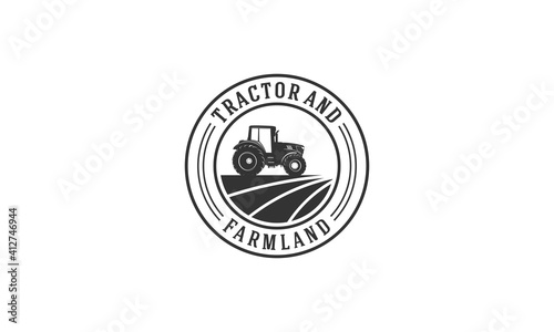 tractor and farmland logo on white background