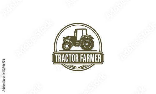tractor and farmland logo on white background