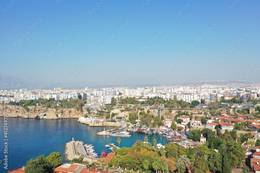 Yacht marina. The beautiful View of the city, yachts and marina in Antalya. Antalya is popular tourist destination in Turkey is a district on the Mediterranean coast.  Aerial view